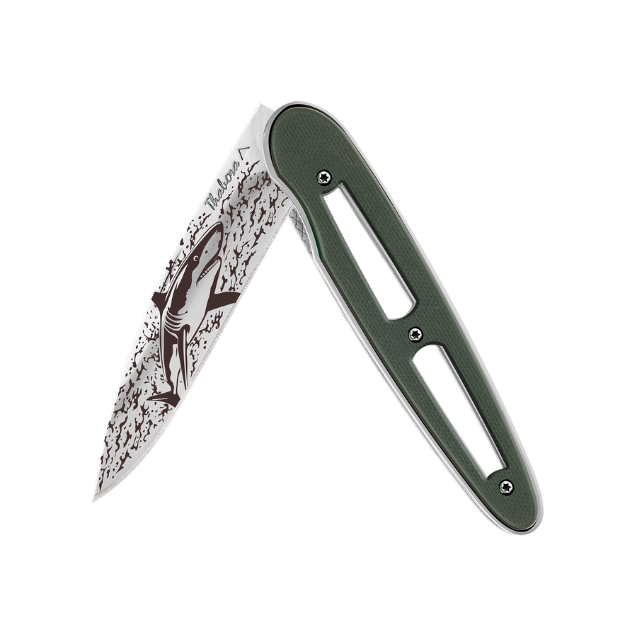 Couteau acier finition brillante plaquette ajourée résine g10 kaki motif «requin»