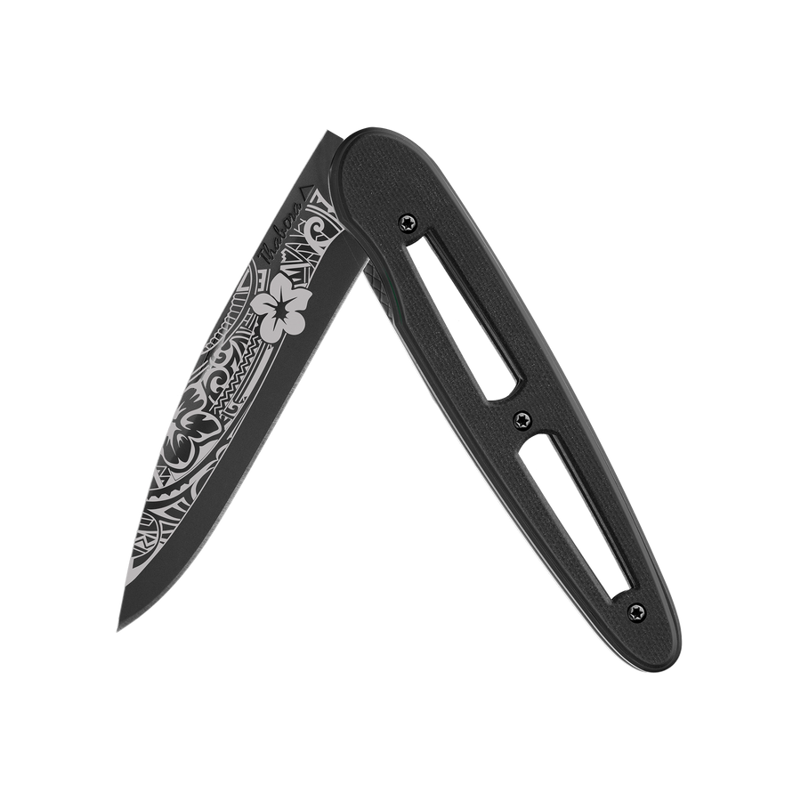 Couteau acier finition titane noir plaquette ajourée résine g10 noir motif «polynésien»