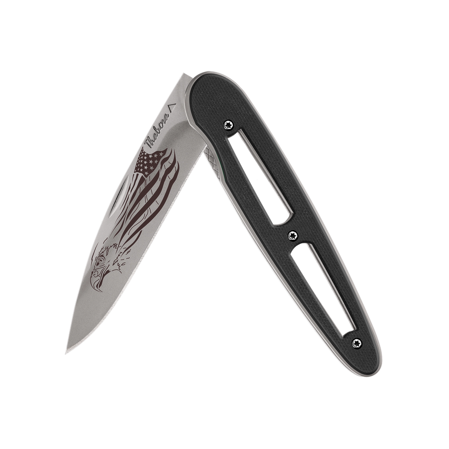 Couteau acier finition titane gris plaquette ajourée résine g10 noir motif «aigle américain»