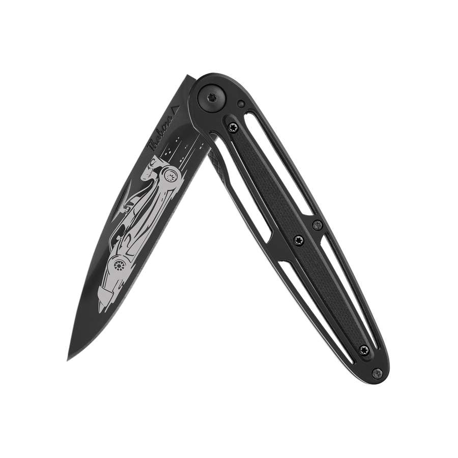 Couteau acier finition titane noir plaquette centrale résine g10 noir motif «formule 1»