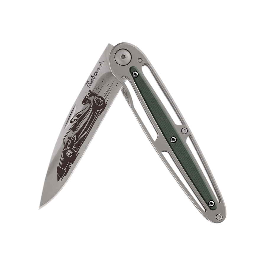 Couteau acier finition titane gris plaquette centrale résine g10 kaki motif «formule 1»