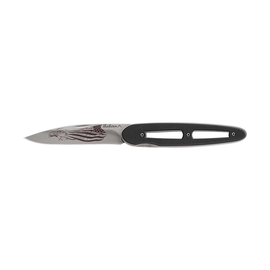 Couteau acier finition titane gris plaquette ajourée résine g10 noir motif «aigle américain»