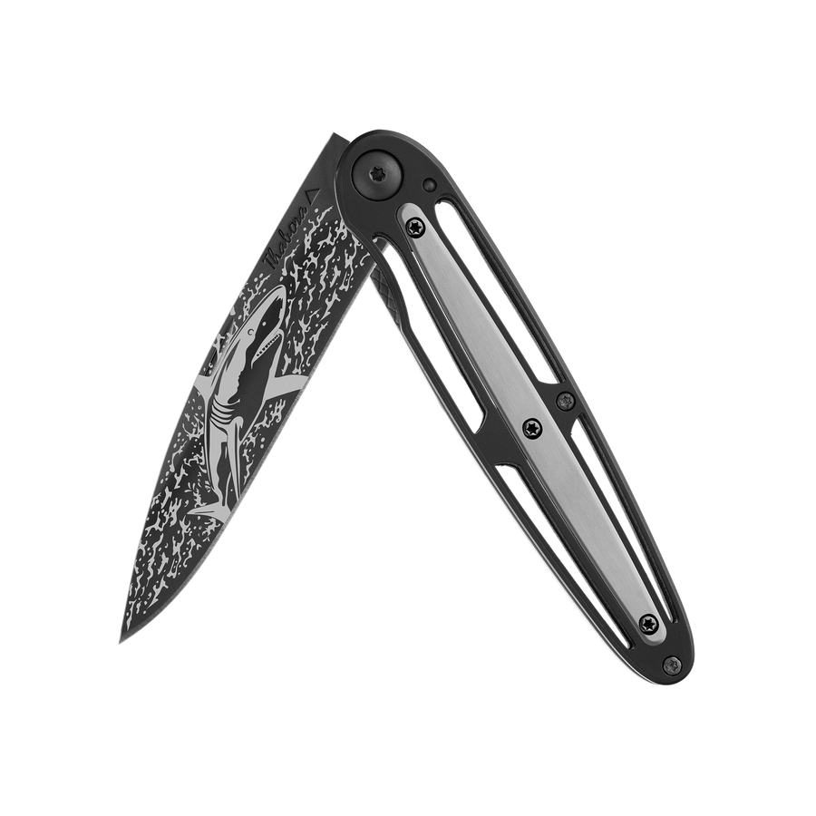 Couteau acier finition titane noir plaquette centrale acier brossé motif «requin»