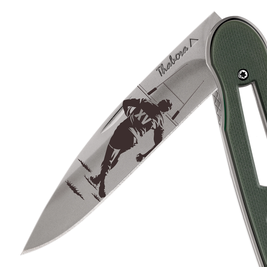 Couteau acier finition titane gris plaquette ajourée résine g10 kaki motif «rugby»