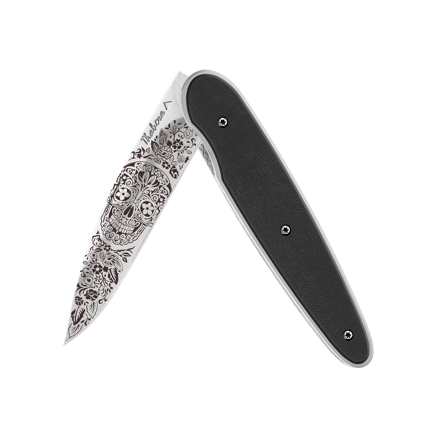 Couteau acier finition brillante plaquette pleine résine g10 noir motif «tête mexicaine»