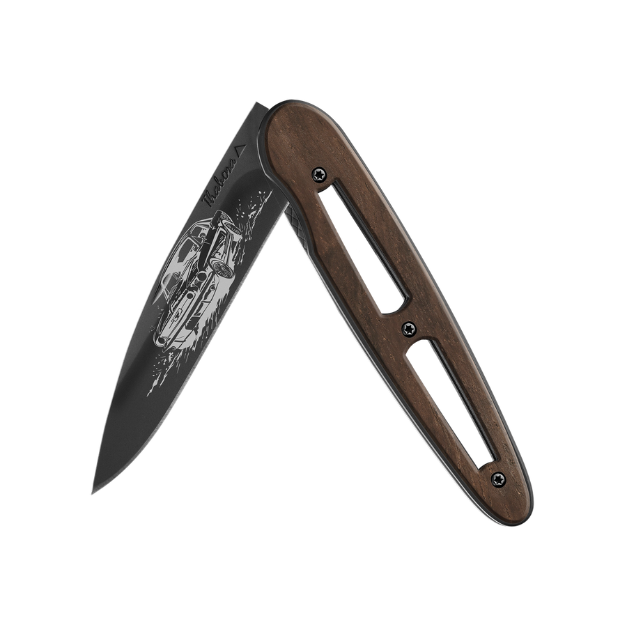 Couteau acier finition titane noir plaquette ajourée bois foncé motif «voiture américaine»