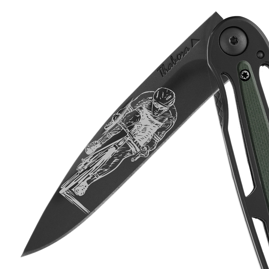 Couteau acier finition titane noir plaquette centrale résine g10 kaki motif «cycliste»