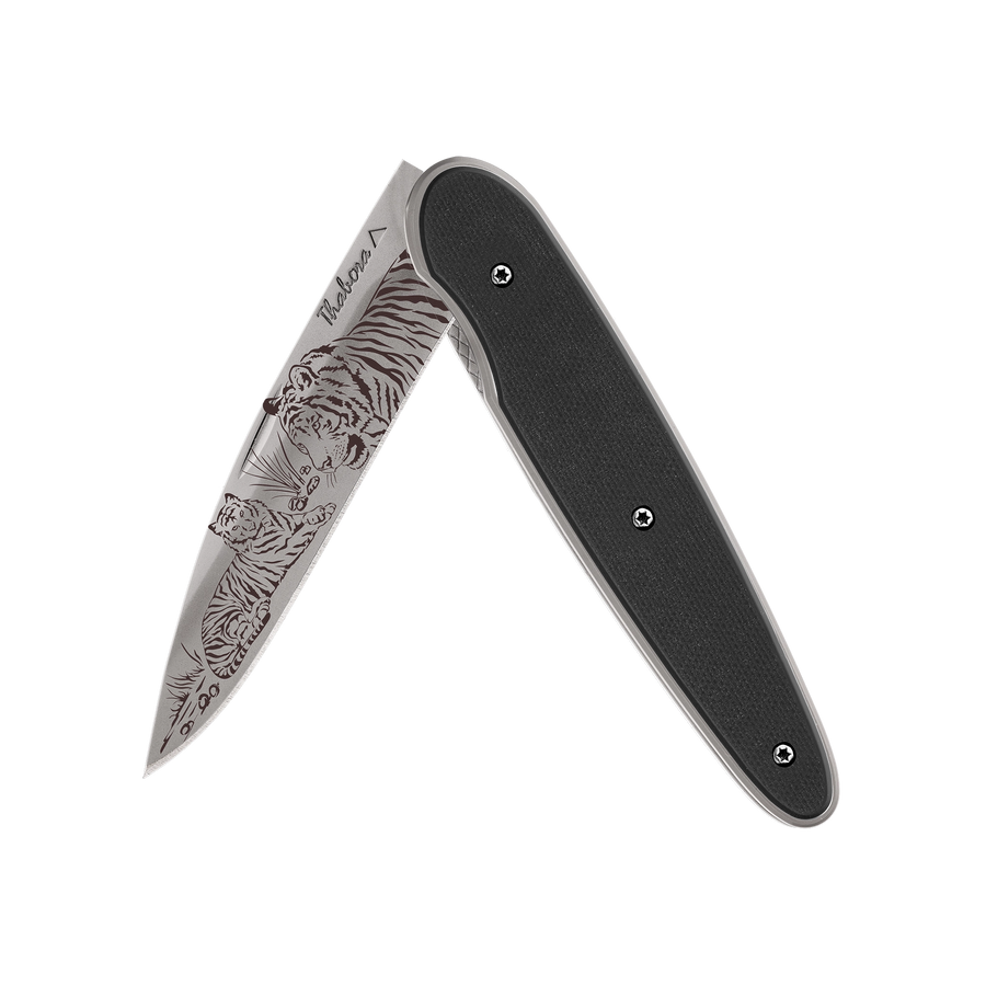 Couteau acier finition titane gris plaquette pleine résine g10 noir motif «tigres»