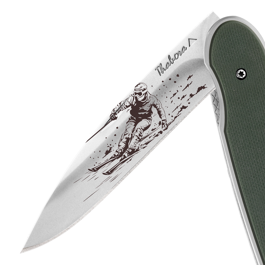 Couteau acier finition brillante plaquette pleine résine g10 kaki motif «skieur»