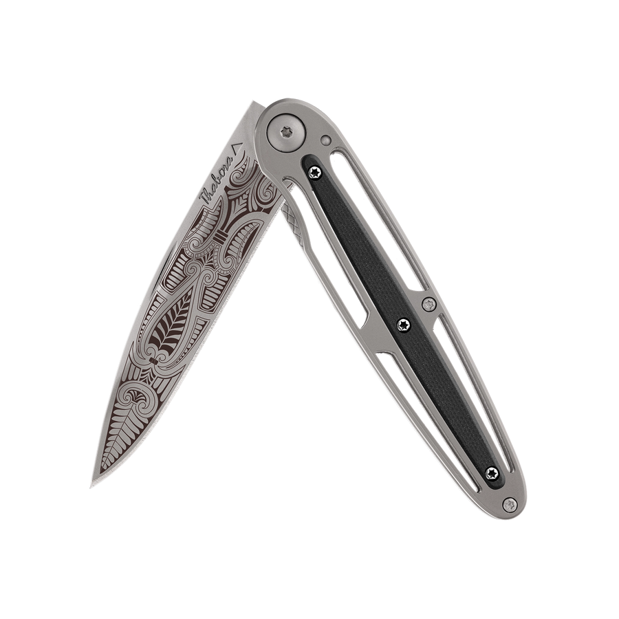 Couteau acier finition titane gris plaquette centrale résine g10 noir motif «cachemire»