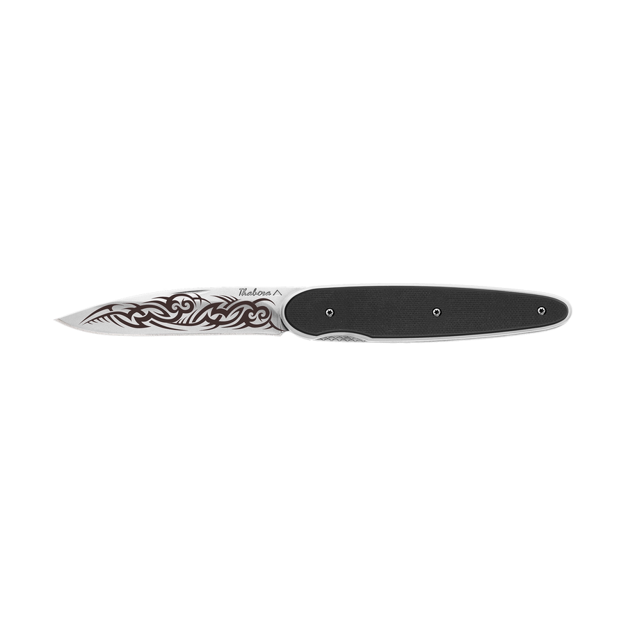Couteau acier finition brillante plaquette pleine résine g10 noir motif «tribal gothique»