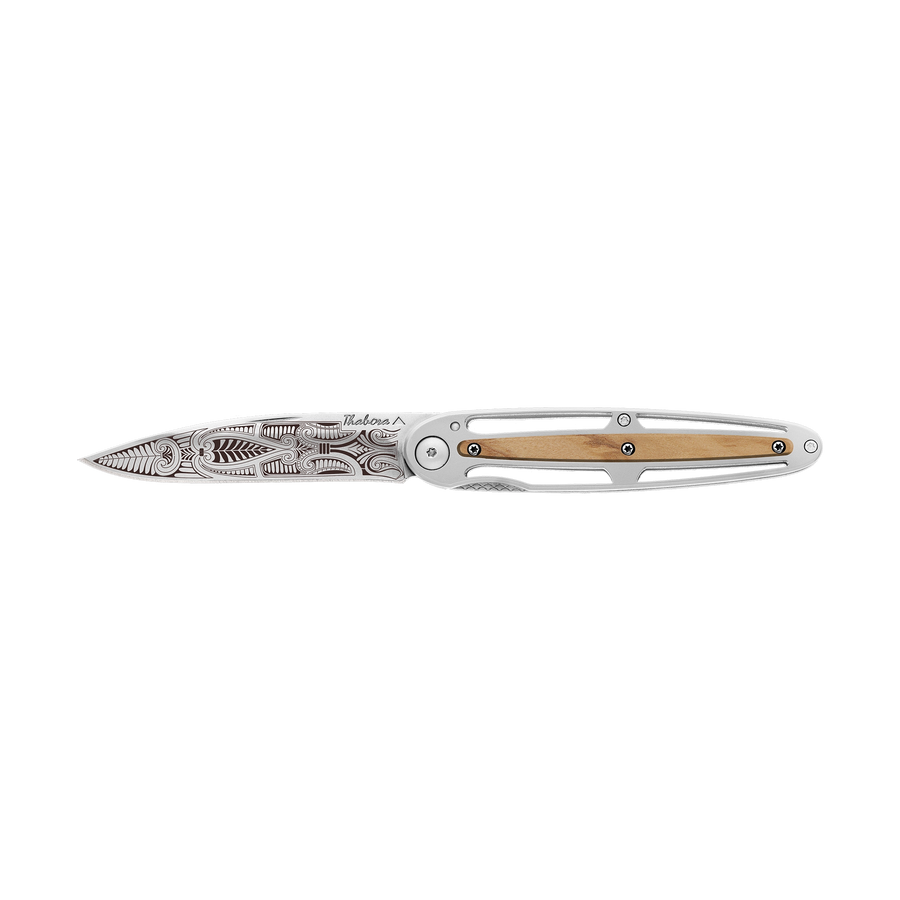 Couteau acier finition brillante plaquette centrale bois clair motif «cachemire»