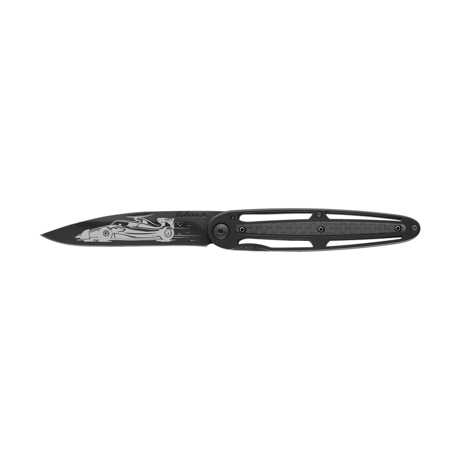 Couteau acier finition titane noir plaquette centrale carbone motif «formule 1»