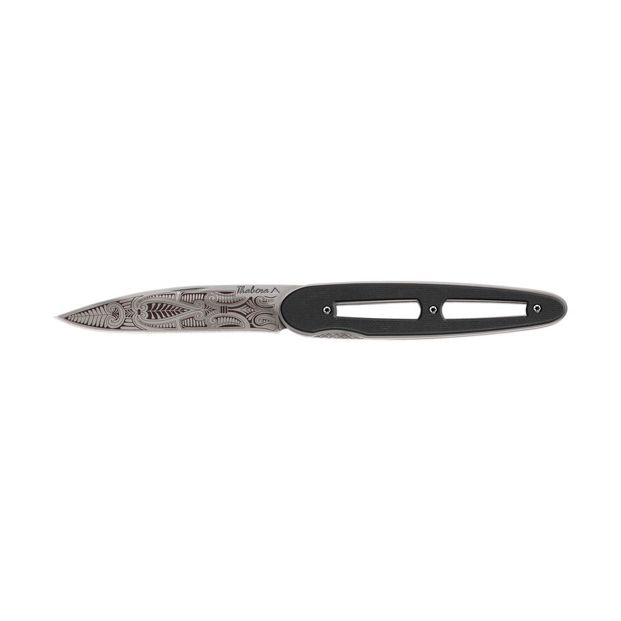 Couteau acier finition titane gris plaquette ajourée résine g10 noir motif «cachemire»
