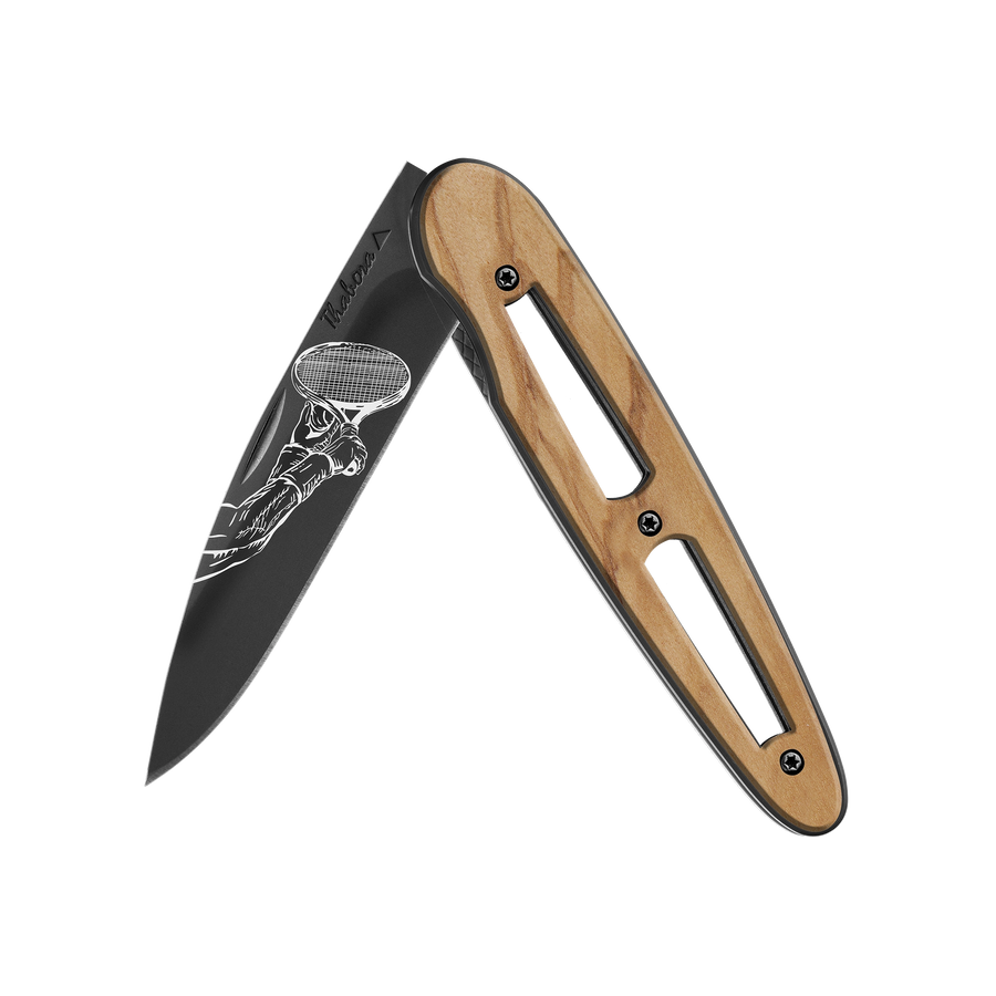 Couteau acier finition titane noir plaquette ajourée bois clair motif «raquette»