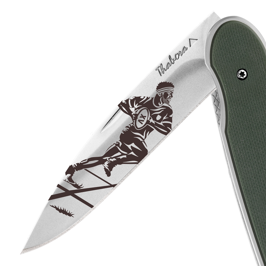Couteau acier finition brillante plaquette pleine résine g10 kaki motif «rugbyman»