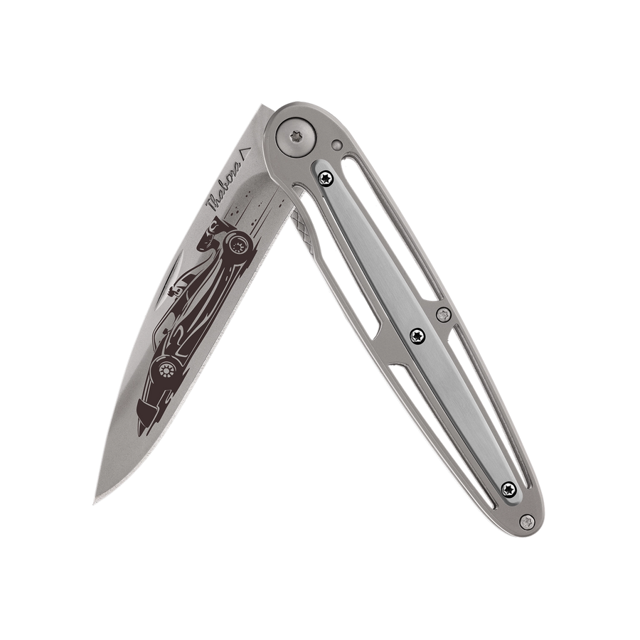 Couteau acier finition titane gris plaquette centrale acier brossé motif «formule 1»