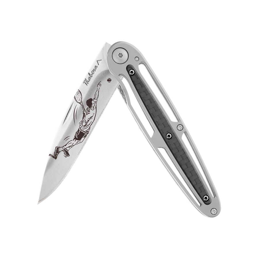 Couteau acier finition brillante plaquette centrale carbone motif «tennisman»