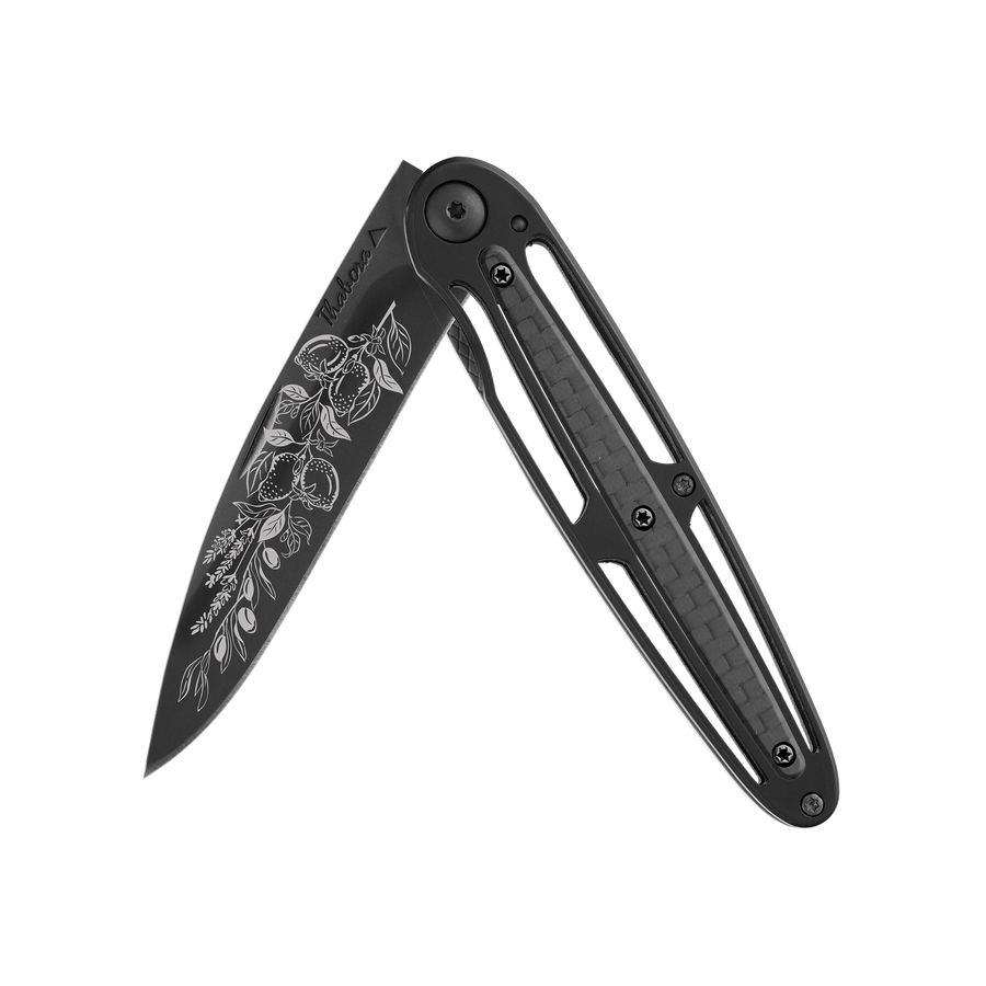 Couteau acier finition titane noir plaquette centrale carbone motif «provencal»