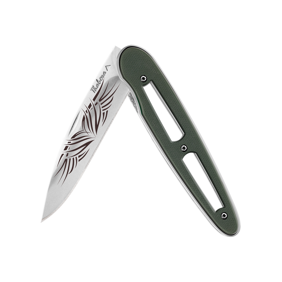Couteau acier finition brillante plaquette ajourée résine g10 kaki motif «tribal»