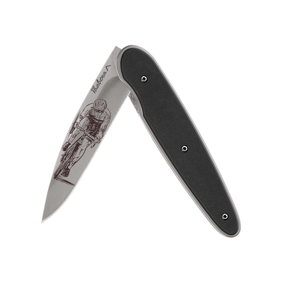 Couteau acier finition titane gris plaquette pleine résine g10 noir motif «cycliste»