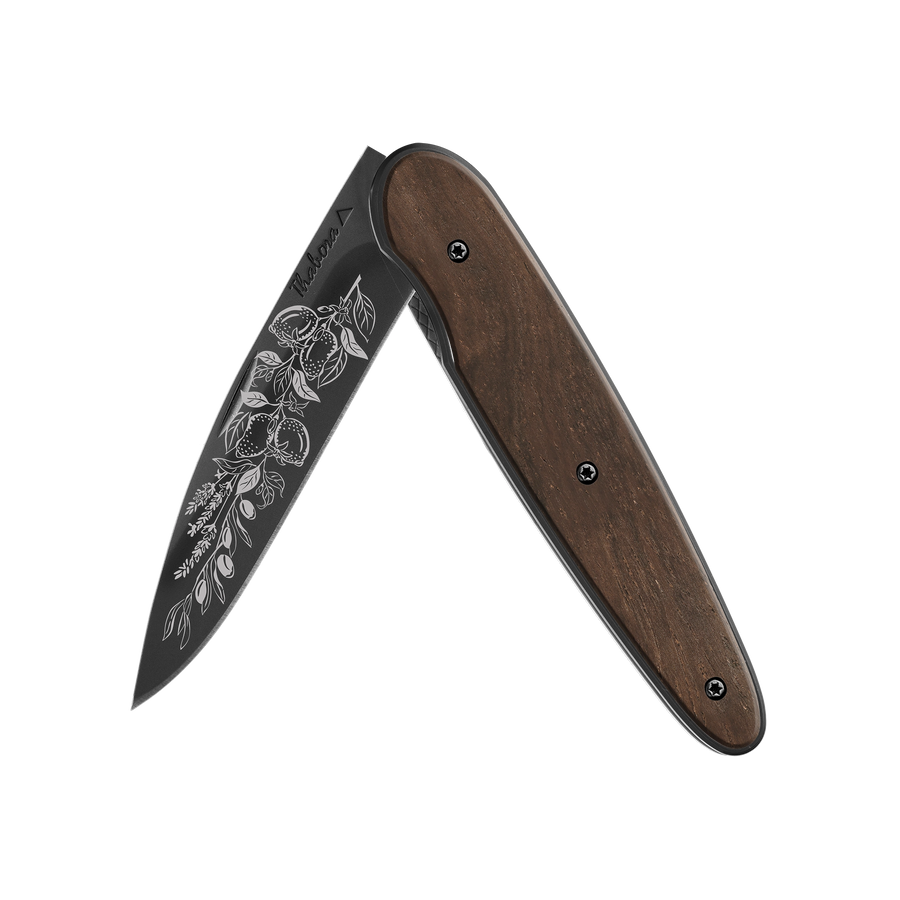 Couteau acier finition titane noir plaquette pleine bois foncé motif «provencal»