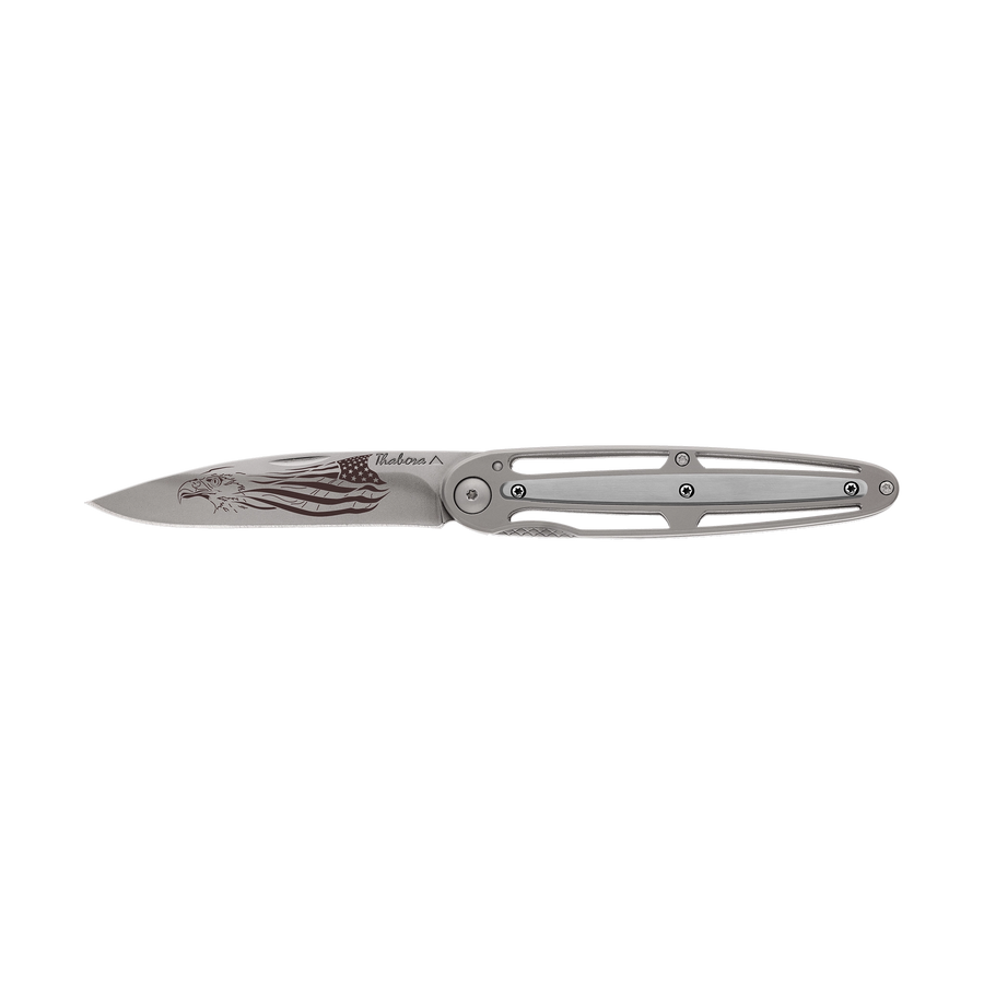 Couteau acier finition titane gris plaquette centrale acier brossé motif «aigle américain»