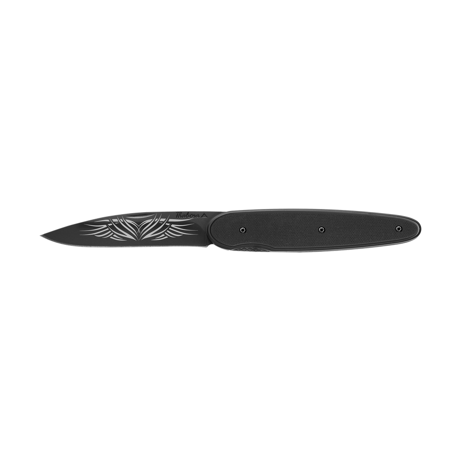 Couteau acier finition titane noir plaquette pleine résine g10 noir motif «tribal»