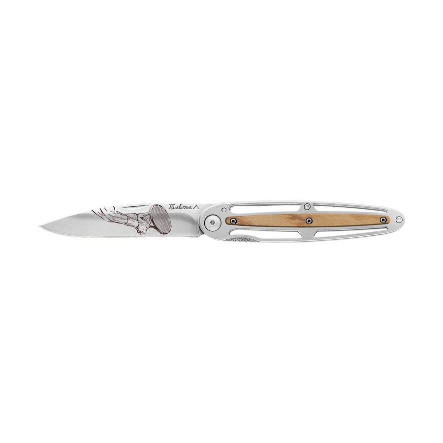 Couteau acier finition brillante plaquette centrale bois clair motif «raquette»