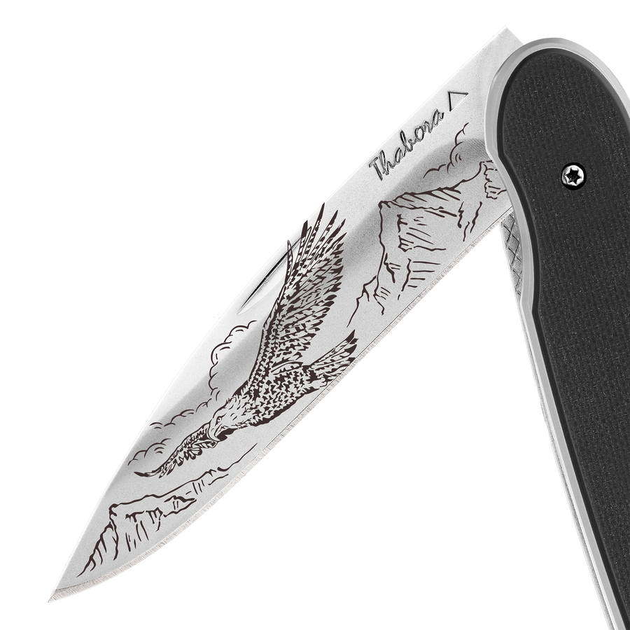 Couteau acier finition brillante plaquette pleine résine g10 noir motif «aigle»