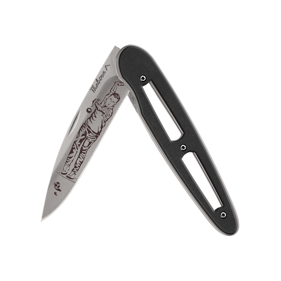 Couteau acier finition titane gris plaquette ajourée résine g10 noir motif «pétanque»