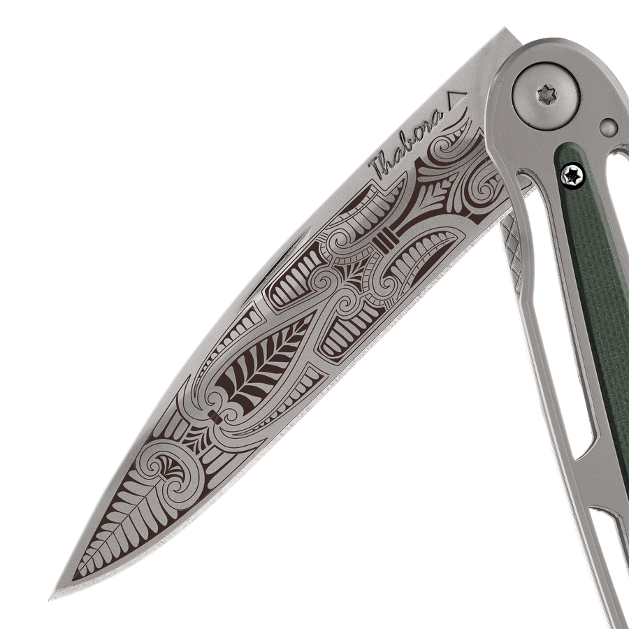 Couteau acier finition titane gris plaquette centrale résine g10 kaki motif «cachemire»