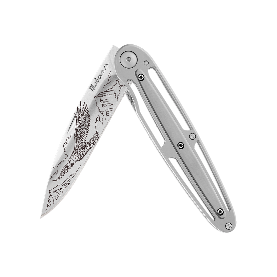 Couteau acier finition brillante plaquette centrale acier brossé motif «aigle»