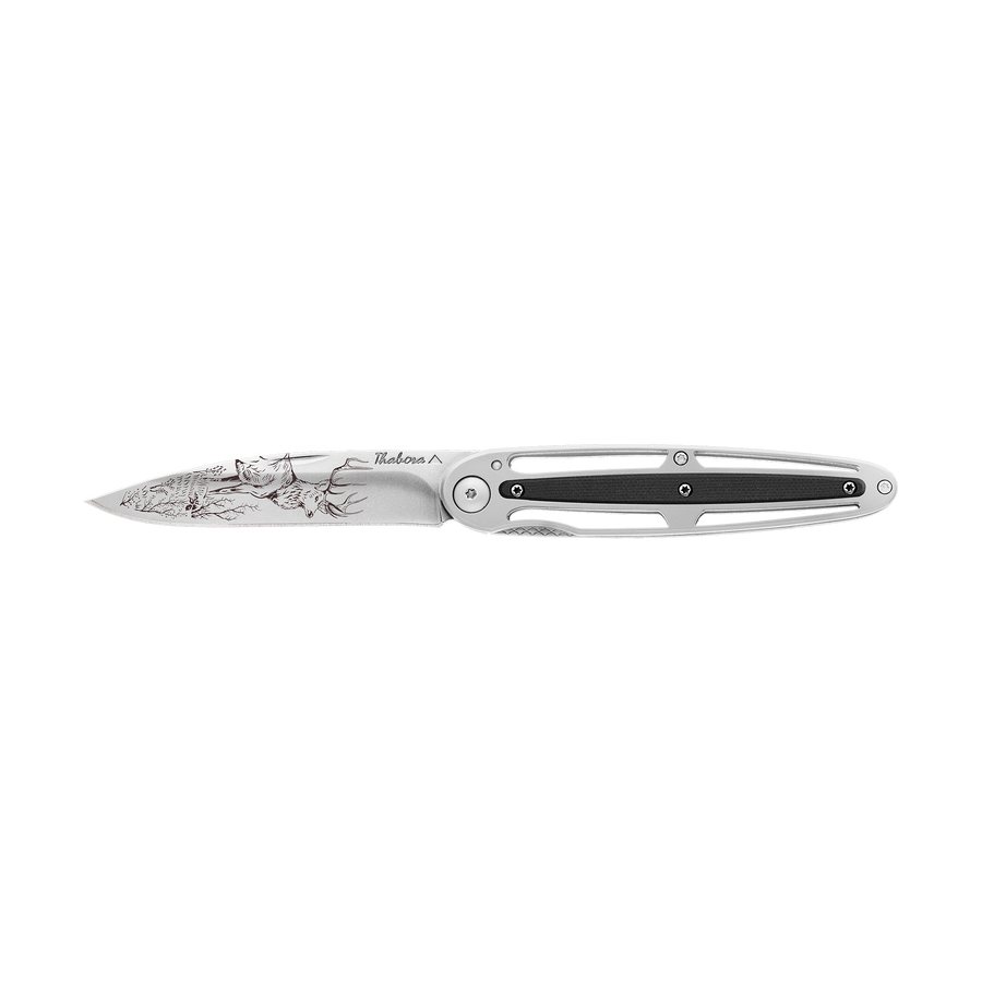 Couteau acier finition brillante plaquette centrale résine g10 noir motif «cerf»