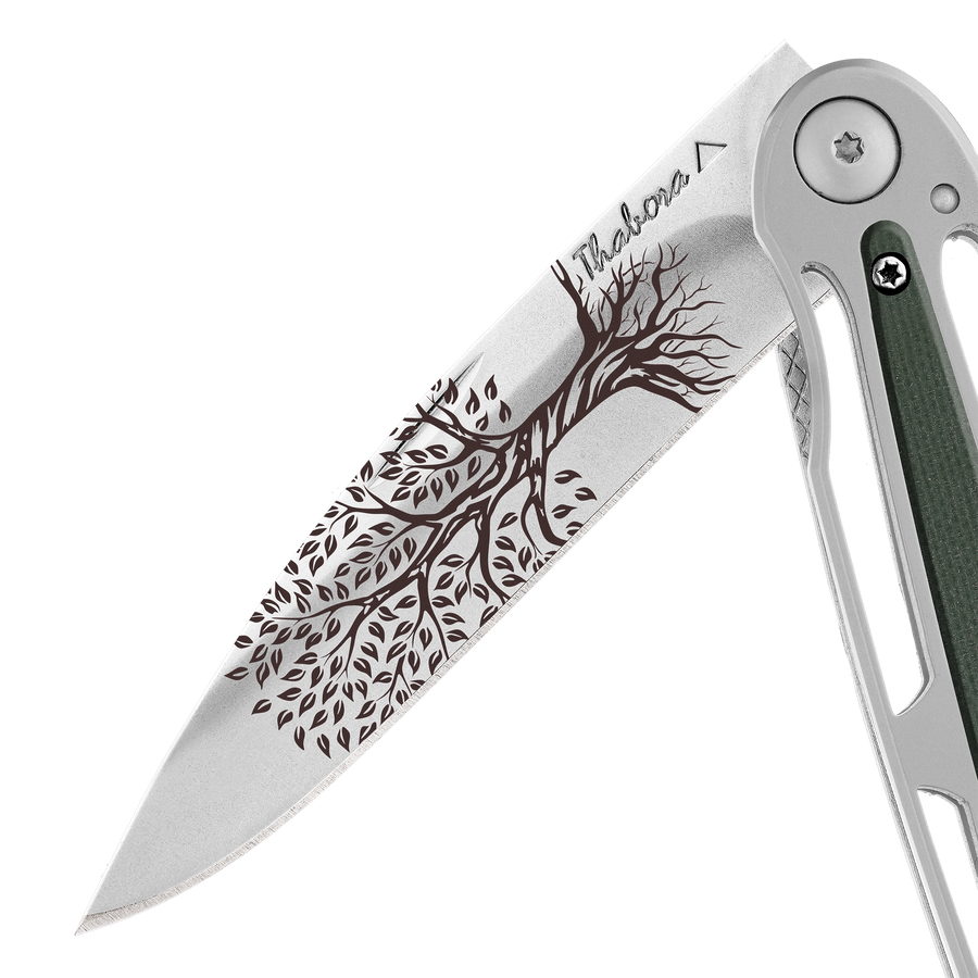 Couteau acier finition brillante plaquette centrale résine g10 kaki motif «arbre de vie»