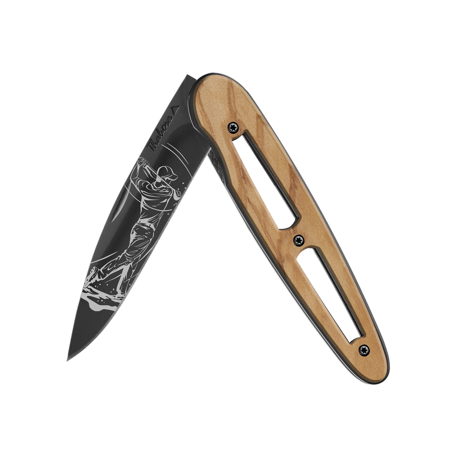 Couteau acier finition titane noir plaquette ajourée bois clair motif «golfeur»