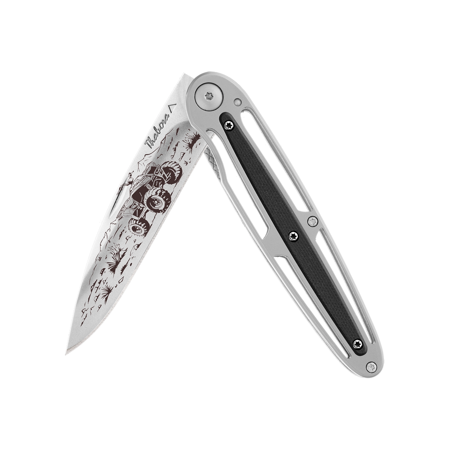 Couteau acier finition brillante plaquette centrale résine g10 noir motif «quad»