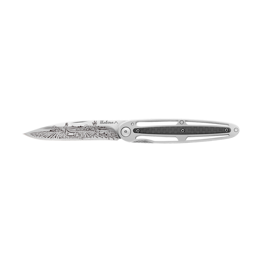 Couteau acier finition brillante plaquette centrale carbone motif «chevreuil»