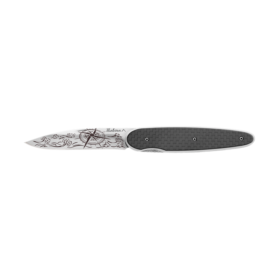 Couteau acier finition brillante plaquette pleine carbone motif «navigation»