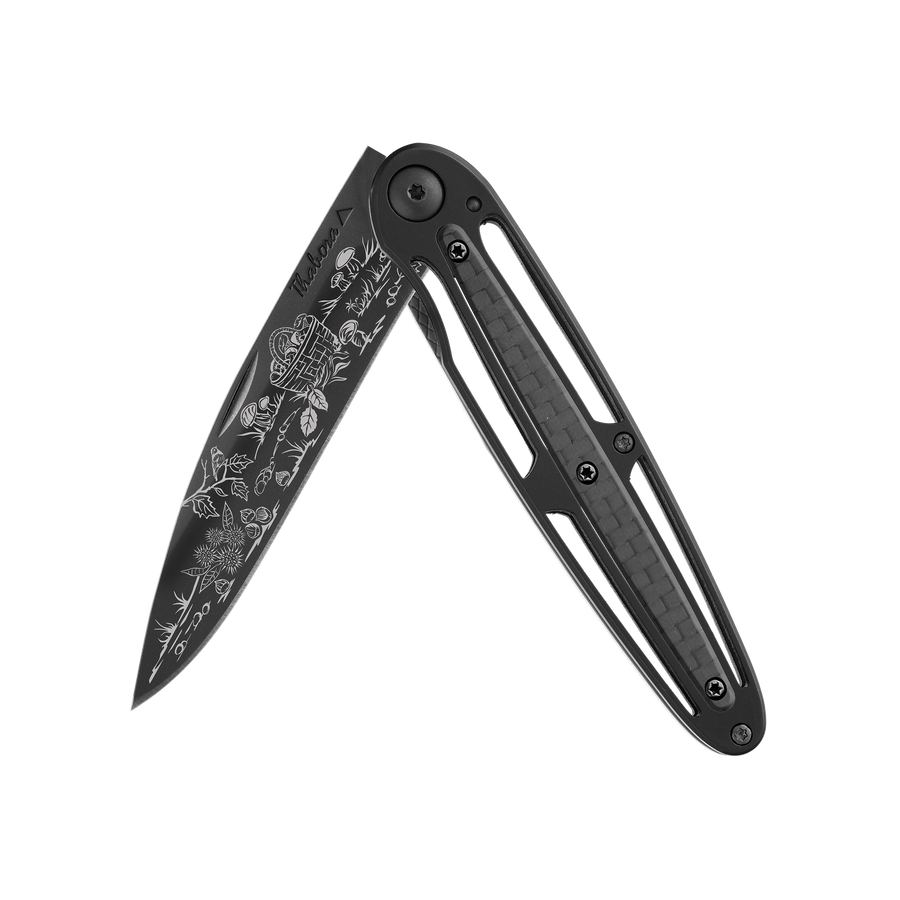 Couteau acier finition titane noir plaquette centrale carbone motif «cueillette d'automne»