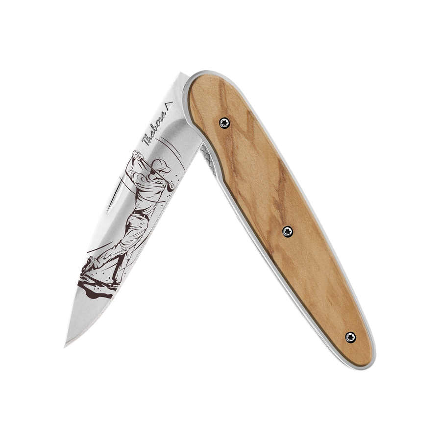 Couteau acier finition brillante plaquette pleine bois clair motif «golfeur»