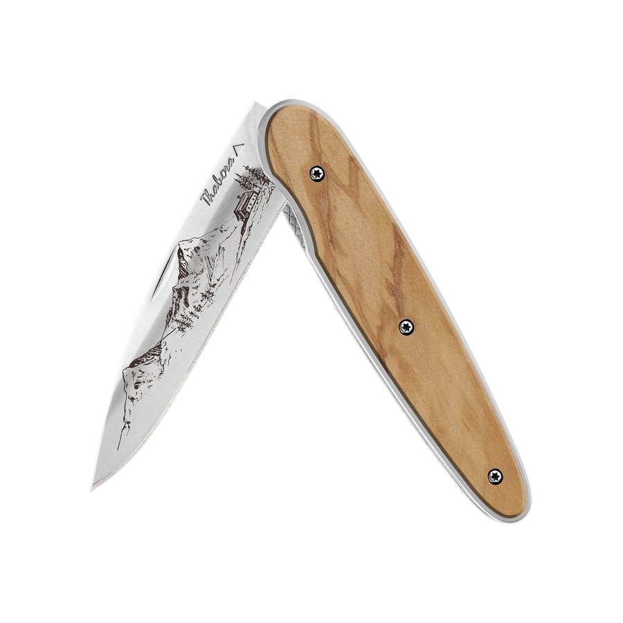 Couteau acier finition brillante plaquette pleine bois clair motif «montagne»