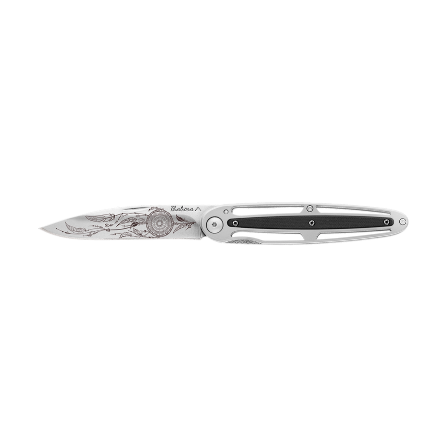 Couteau acier finition brillante plaquette centrale résine g10 noir motif «attrape rêves»