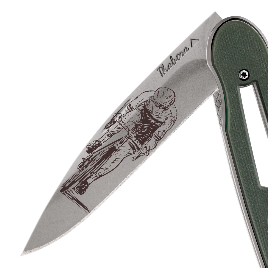 Couteau acier finition titane gris plaquette ajourée résine g10 kaki motif «cycliste»