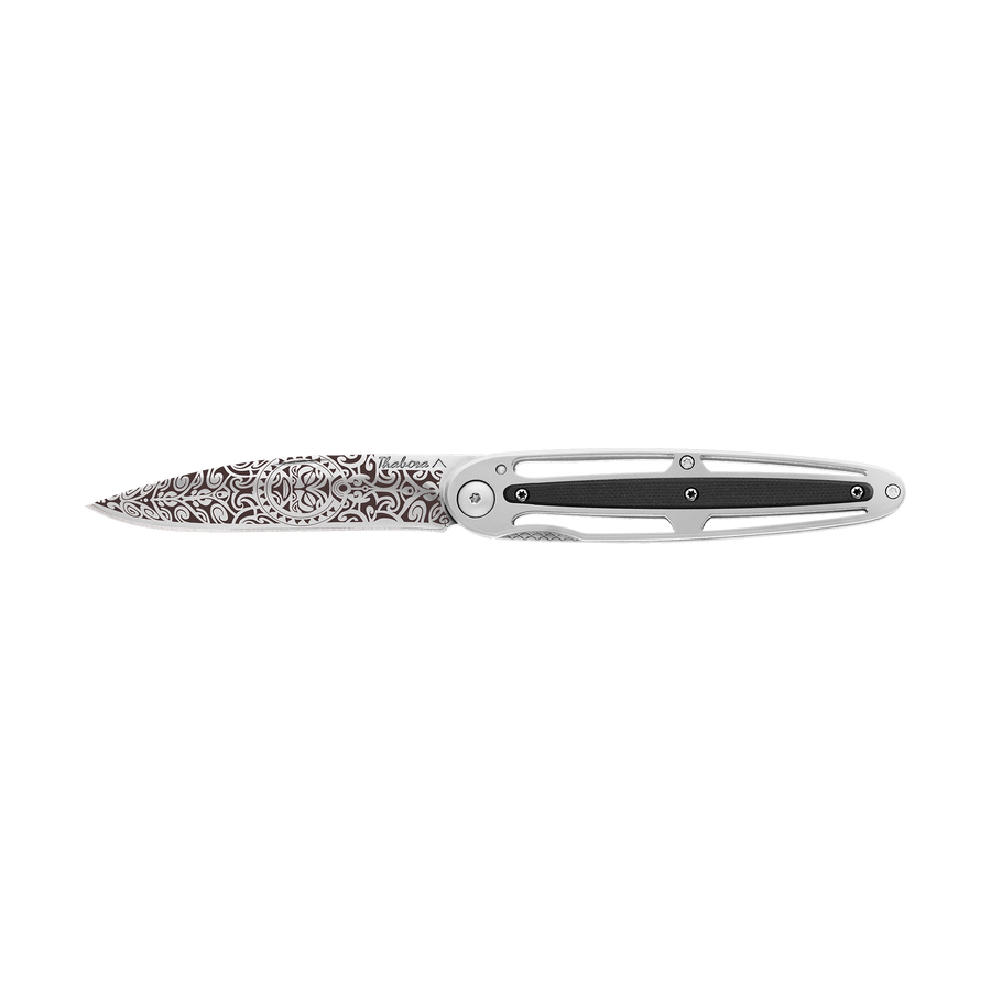 Couteau acier finition brillante plaquette centrale résine g10 noir motif «tiki»