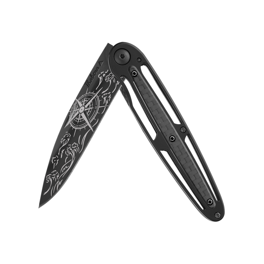 Couteau acier finition titane noir plaquette centrale carbone motif «navigation»