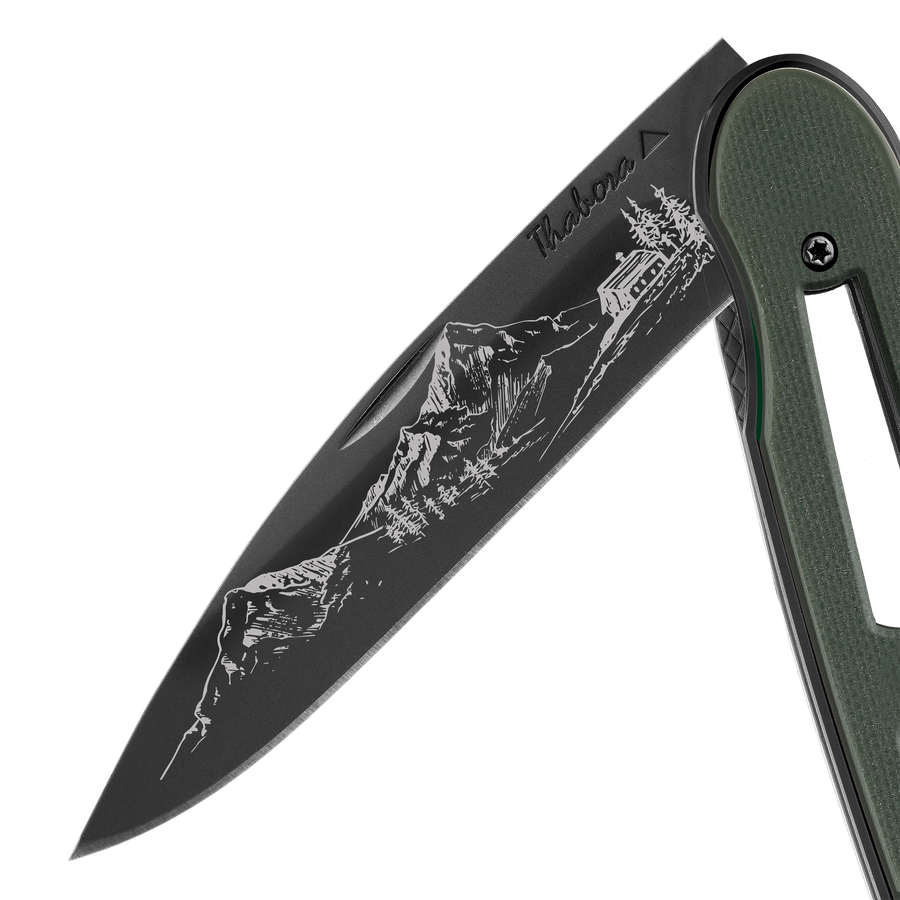 Couteau acier finition titane noir plaquette ajourée résine g10 kaki motif «montagne»