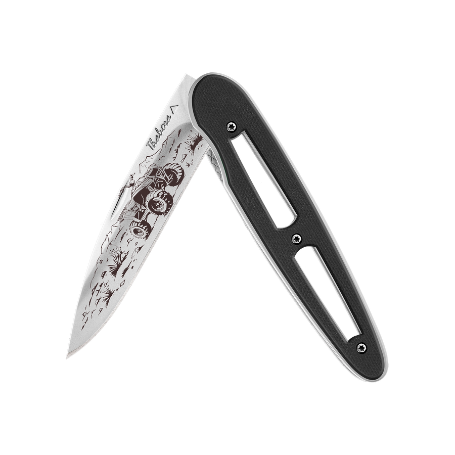 Couteau acier finition brillante plaquette ajourée résine g10 noir motif «quad»