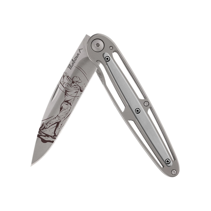 Couteau acier finition titane gris plaquette centrale acier brossé motif «golfeur»