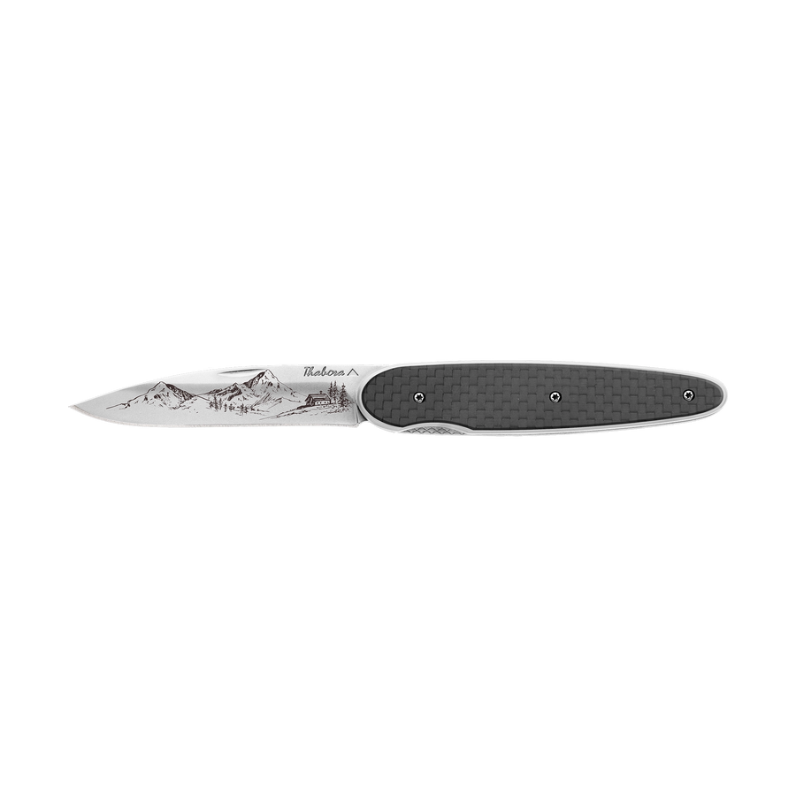 Couteau acier finition brillante plaquette pleine carbone motif «montagne»